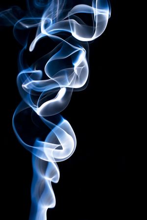 Abstract smoke over black backgroundの写真素材