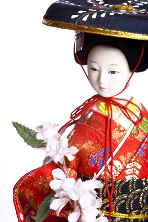 Asian geisha doll on whiteの写真素材