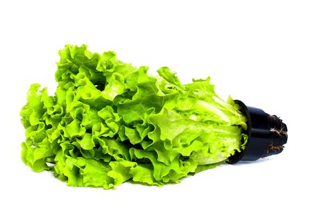 Fresh green lettuce with roots isolated on whiteの写真素材