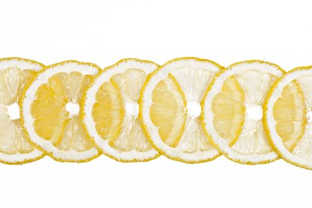 Sliced lemon isolated over whiteの写真素材