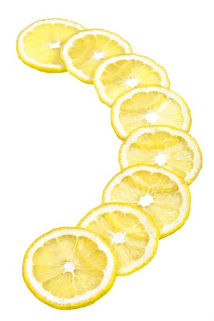 Sliced lemon isolated over whiteの写真素材