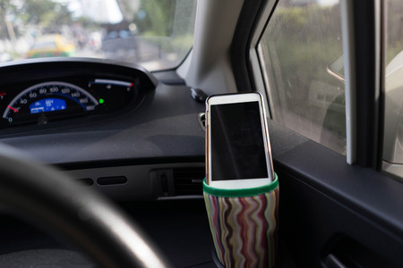 smart phone on car console for comminication and online with social network