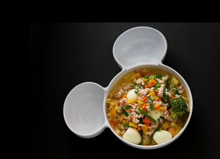 egg vegettable and pork soup on black background,top viewの写真素材