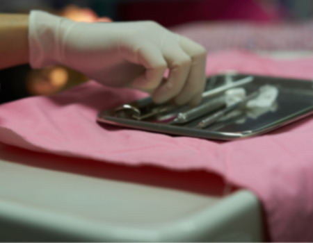 blur photo of doctor or dentist hand pick toolsの写真素材