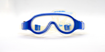Blue rubber half plastic tranparent goggles for kid on isolated white background with copy text spaceの写真素材