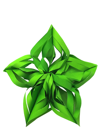 Green paper cut star on isolated white backgroundの写真素材