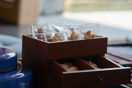 Snack such as cookies ,Thai deserts in drawer box on tableの写真素材