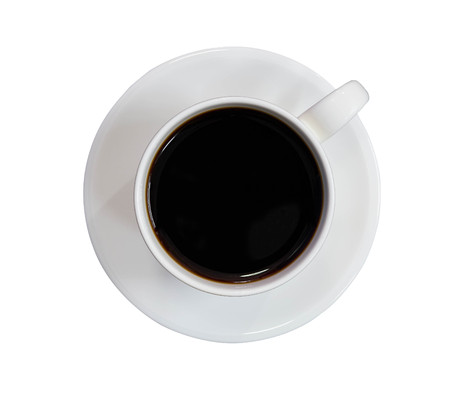 Coffee filled cup top view on isolated white backgroundの写真素材