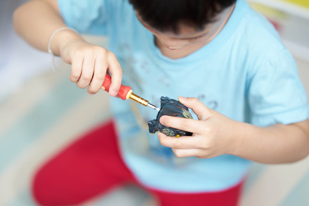 Robot toy fix by kidの写真素材