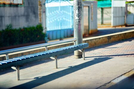 Chairs or seats at old or street bus stopの写真素材