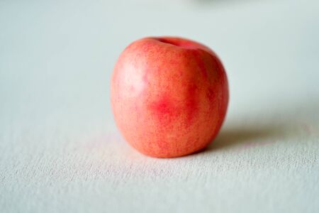 Apple on fibril floorの写真素材