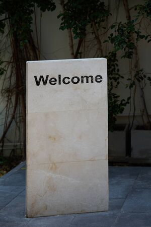 Rock manument stand for welcome message reception label or stone signの写真素材