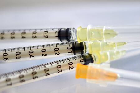 Needles and syringes in closed up macro focusの写真素材