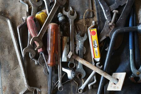 pile of mechanical tools for fix in home ,old fashion ,top view