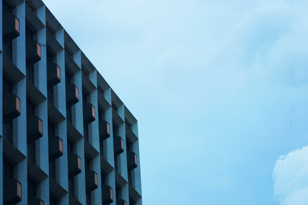 Modern wall with windows of city resident in abstract view