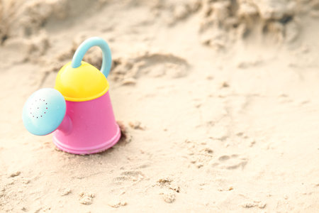 toy beach pot for play sand on beach sand in summer conceptの写真素材