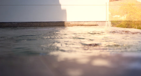 water in swimming with sun light,selective focusの写真素材