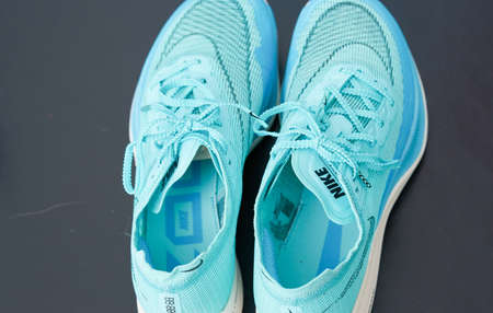 Bangkok,Thailand,Feb 10,2021- teal aqua Nike running shoes on floor top viewのeditorial素材