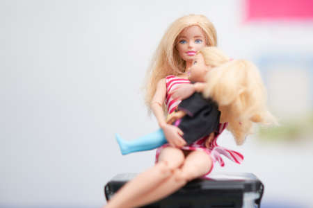 Bangkok,Thailand,Aug 10,2021- Barbie dolls mom and little daughter hold in hug sit on tableのeditorial素材