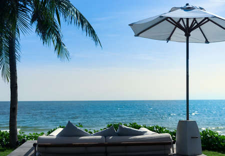sofa chair beside beach for seeing view of the sea in hotel resortの写真素材