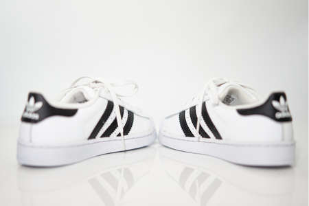 bangkok,Thailand,July 2,2021-original adidas  sneakers shoes with shoelace on white floor rear back view soft focus with copy spaceのeditorial素材