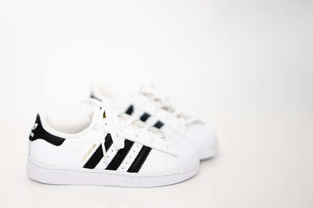 bangkok,Thailand,July 2,2021-original adidas  sneakers shoes with shoelace on white floor side view...