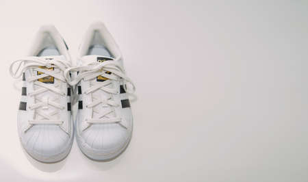 bangkok,Thailand,July 2,2021-original adidas  sneakers shoes with shoelace on floor front high angle...