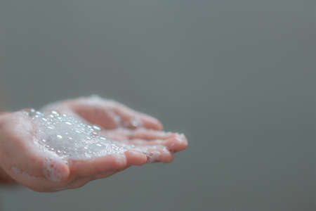 hand hold bubbles in palm with light