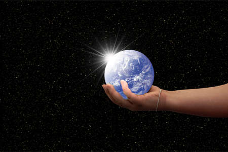 Hand hold world globe for eco environment protection and save blue planet from global warming with care business health care and technologyの写真素材