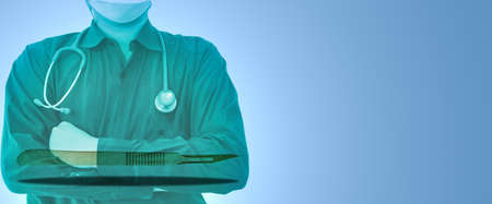 hospital doctor hang stethoscope on medical tools background with copy spaceの写真素材
