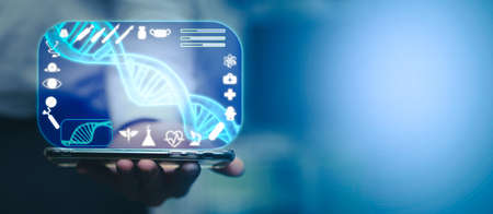 person hold computer show screen of dna double helix of chromosome make technology to change medical drug treatment genome biology science research in chemical molecular level fior life biotechnology concept on hologram displayの写真素材