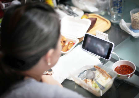 woman watch movie on smartphone