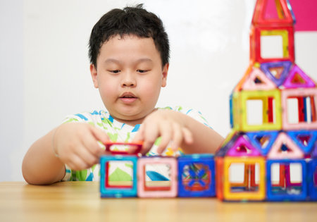boy building a toy house be creativeの写真素材
