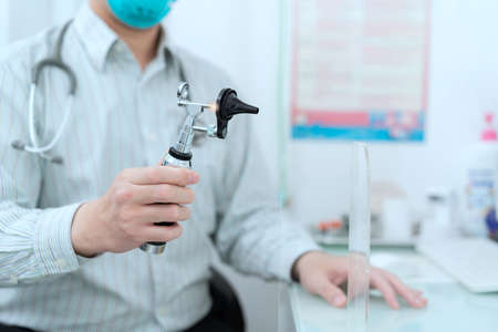 doctor check ear in clinicの写真素材