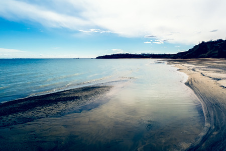 ripples on the transparent azure waters of the surfの写真素材