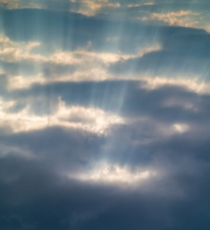 Sun rays which peek through the clouds