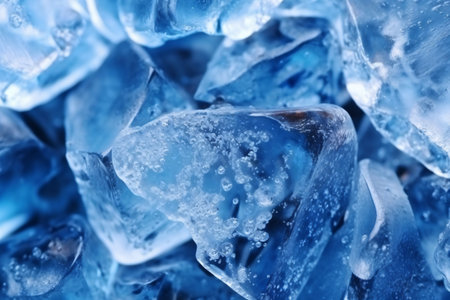 Ice crystals close-up. Macro shot of ice crystals. Blue background.の素材