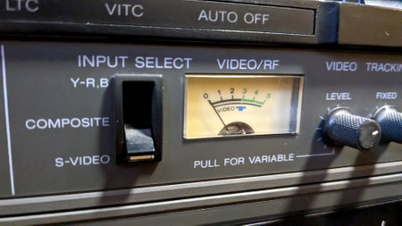 Vintage radio control panel with volume control. Selective focus.