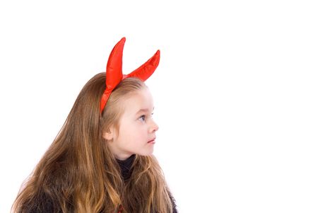 Young Child Dressed in a Devil Costume on White Background