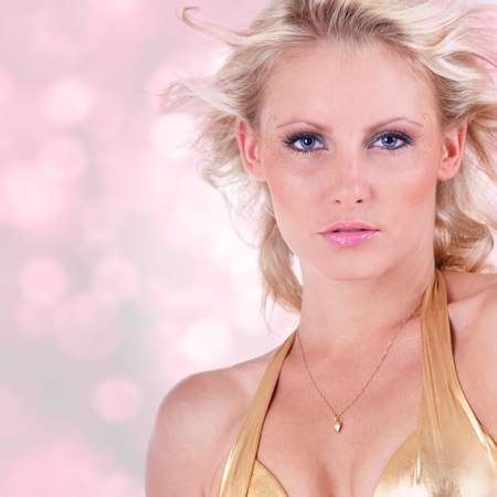 Fashion portrait of attractive young czech girl on pink backgroundの写真素材