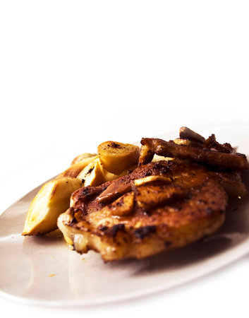 pork chop isolated on white backgroundの写真素材