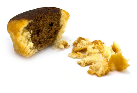 chocolate muffin on white isolated backgroundの写真素材