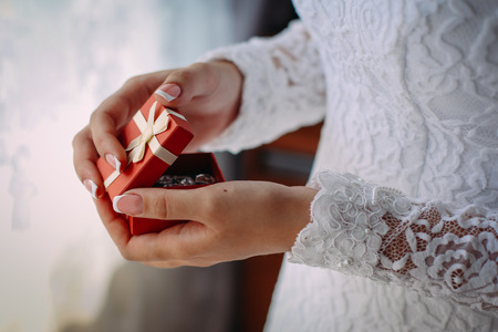 bride holding an earringの写真素材
