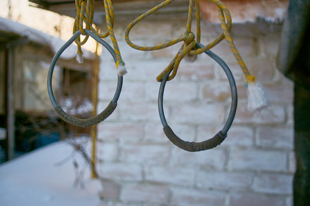 Empty swing in playground - Covered in snow