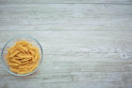 pasta on a colored background, space for text