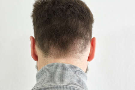 the back of the head of middle-aged men, male body partsの写真素材