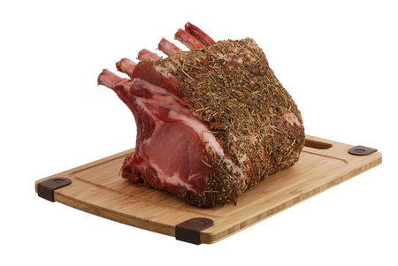 Seasoned pork foreloin on bamboo cutting board  isolated on white backgroundの写真素材