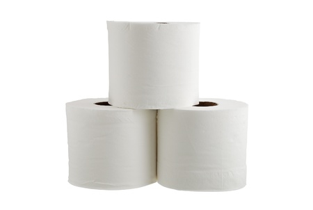 Three rolls of toilet paper formed in pyramid isolated on white backgroundの写真素材