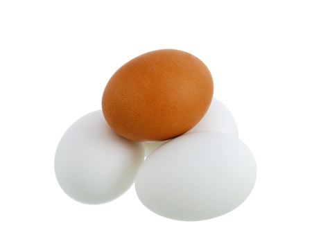 Four different colors eggs pyramid isolated on white backgroundの写真素材