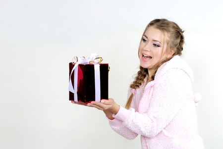 The young beautiful girl an angel with giftsの写真素材